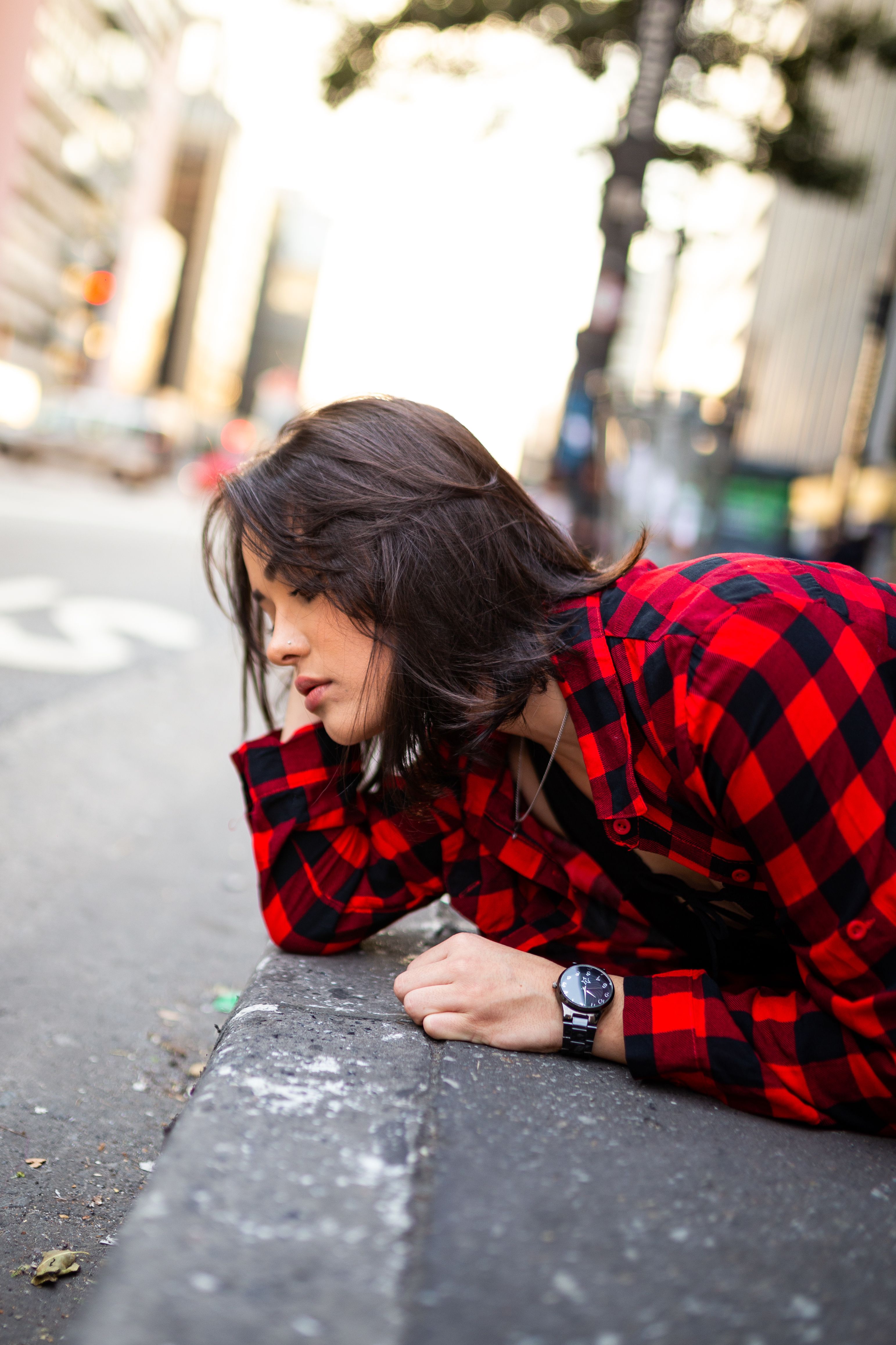 Photo of Woman Wearing Red Plaid Shirt 
