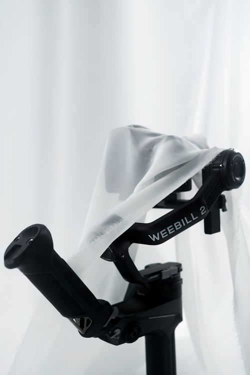Free Close-up of Weebill 2 gimbal wrapped in fabric for an artistic studio presentation. Stock Photo