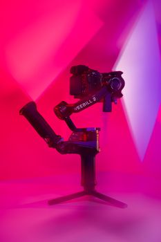 Weebill 2 gimbal camera setup with striking pink and purple lighting.