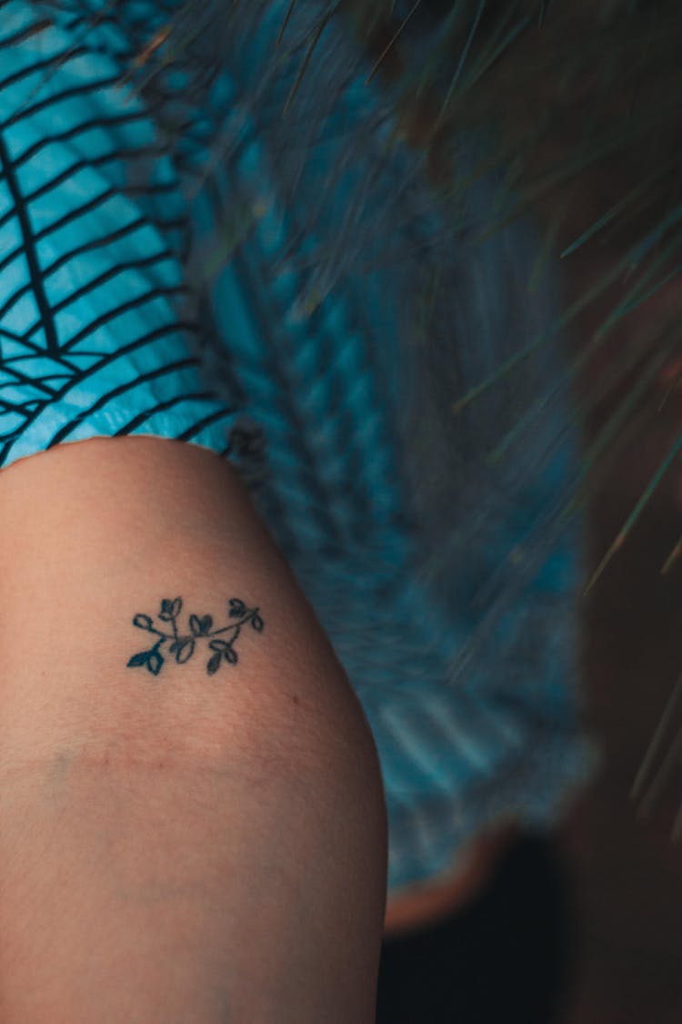 Close-Up Photo Of Person With Tattoo