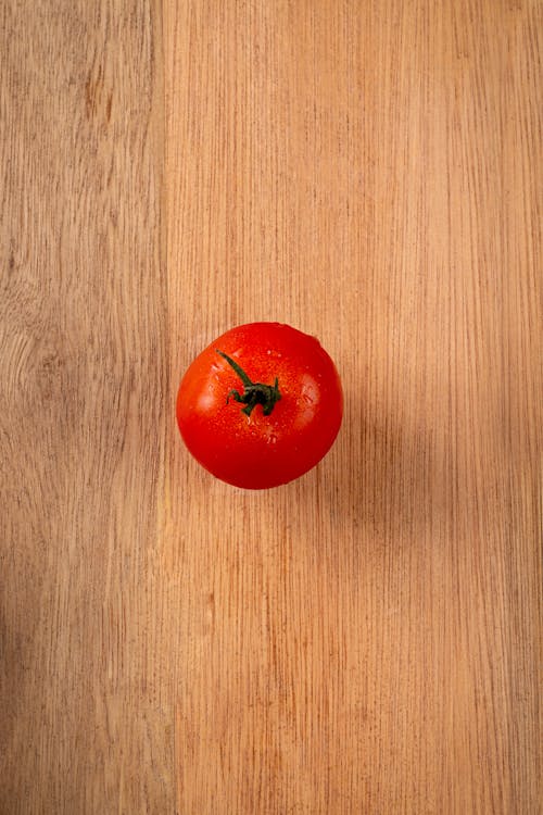 Tomato on Cutting Board