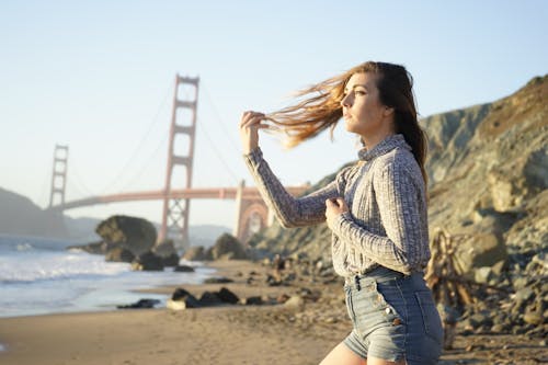 Woman Near Golden Gate Bridge In San Francisco