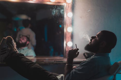 Free Photo of Man Smoking Cigarette Stock Photo