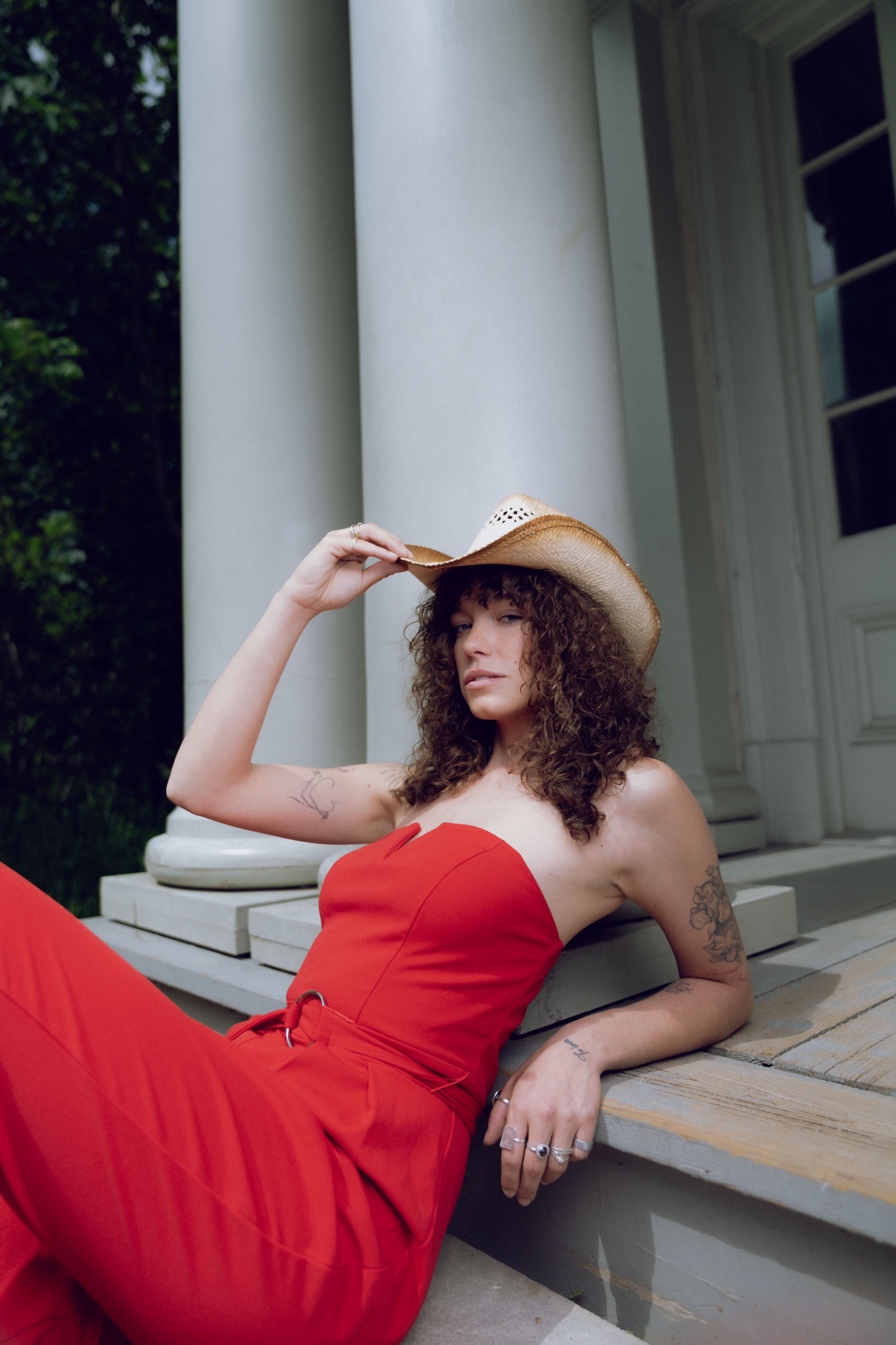 A woman in a red dress and cowboy hat · Free Stock Photo
