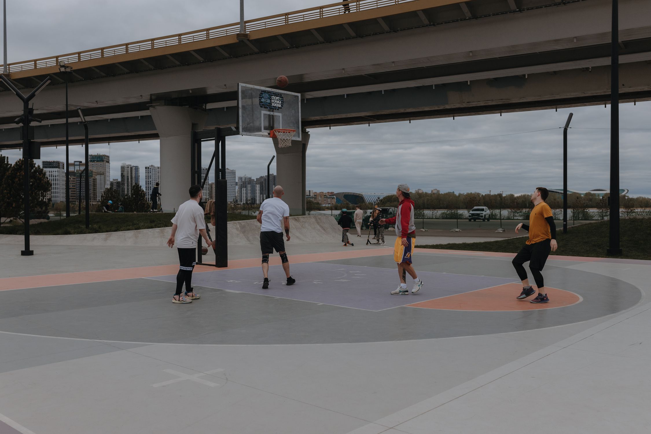 Hoops Bridge Young Men Playing Basketball under a Bridge · Free Stock Photo