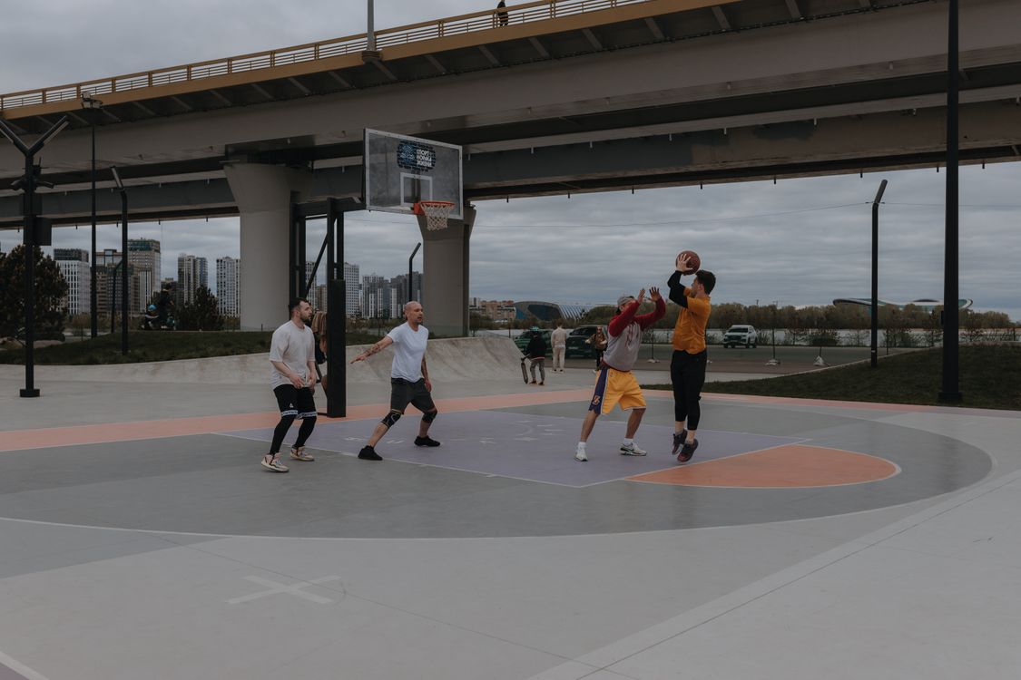 Hoops Bridge Young Men Playing Basketball under a Bridge · Free Stock Photo
