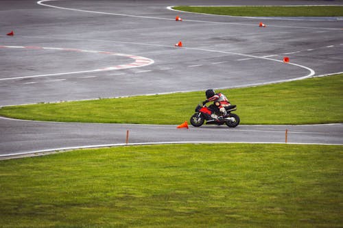 A person riding a motorcycle on a race track