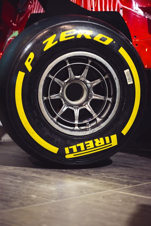 A close up of the tire of a ferrari car