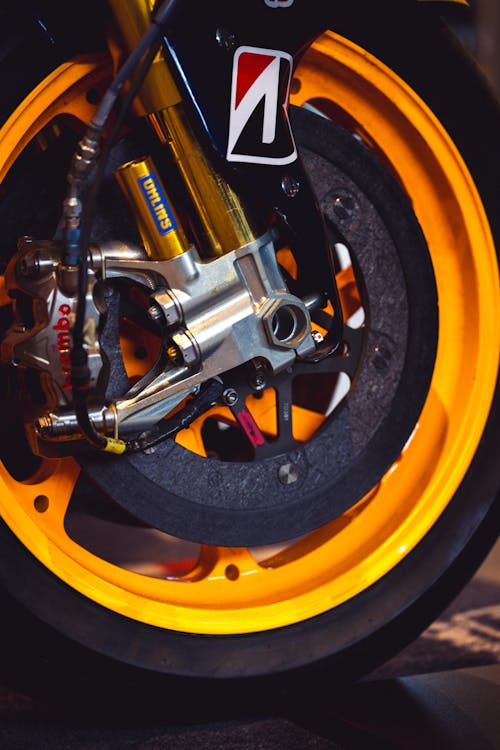A close up of the front wheel of a motorcycle