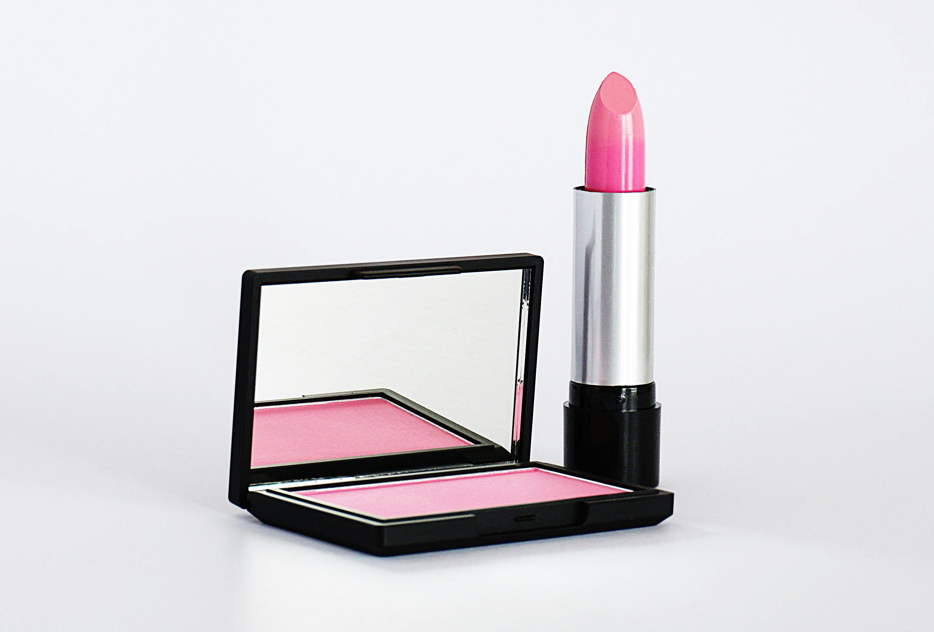 close up photo of pink lipstick and blush on