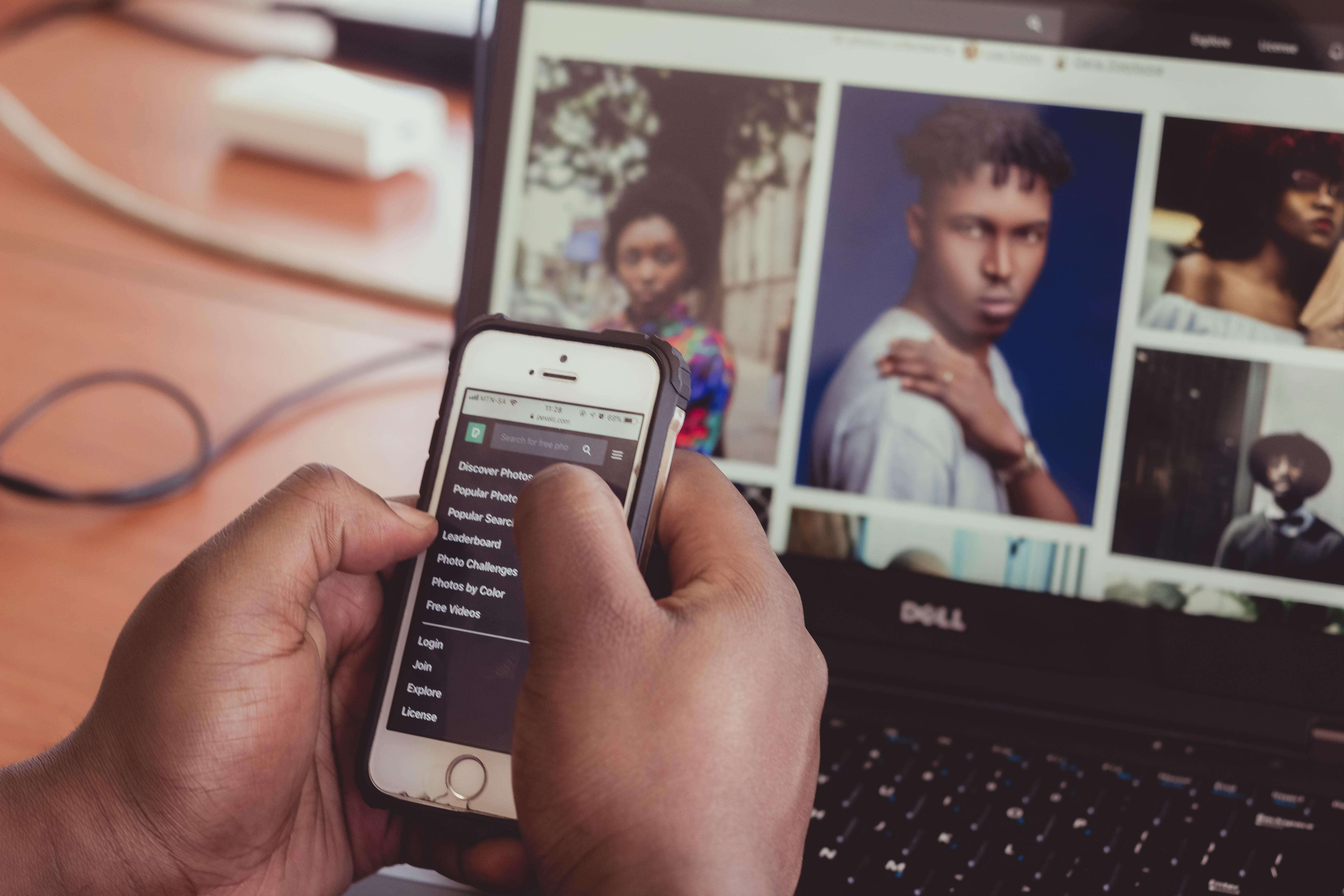 photo of person holding iphone