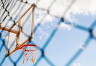 Low-Angle Photo of Basketball Hoop Under Blue Sky
