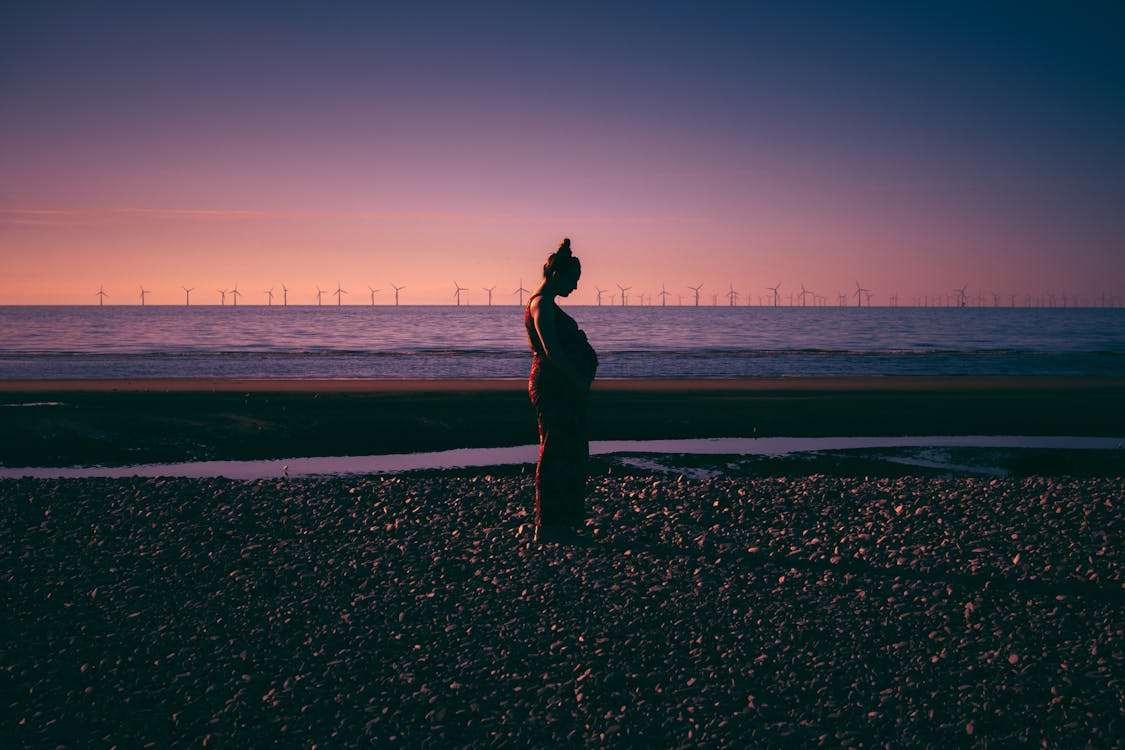 Free Woman Standing on Ground Stock Photo