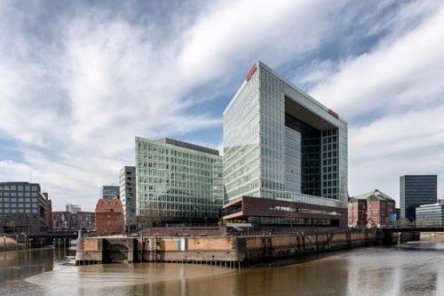 Free Stylish view of Spiegel Building in Hamburg, Germany with cloudy sky backdrop. Stock Photo