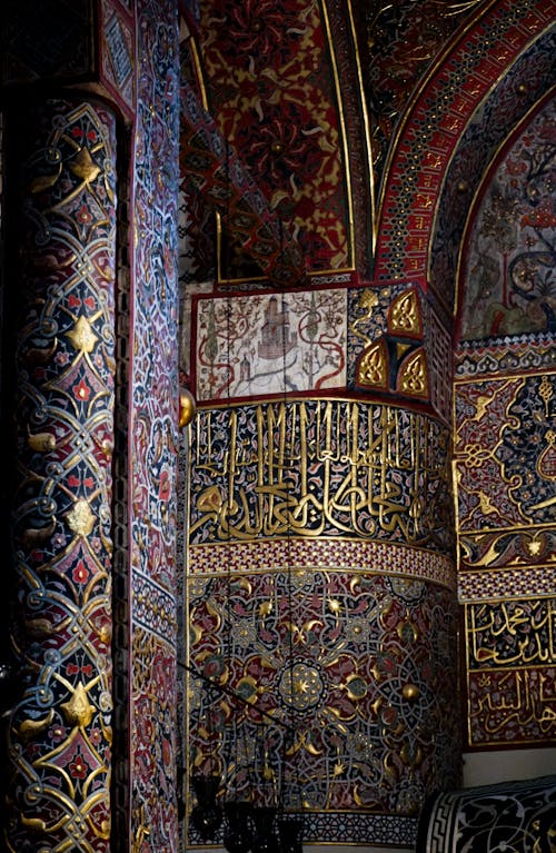The interior of a mosque with ornate designs