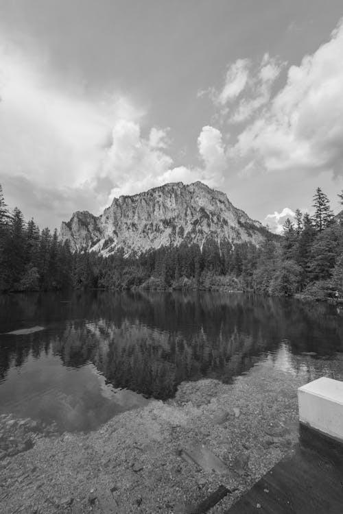 Black and white photo of a mountain lake