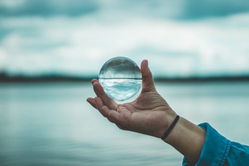 Free Photo of Person Holding Lensball Stock Photo