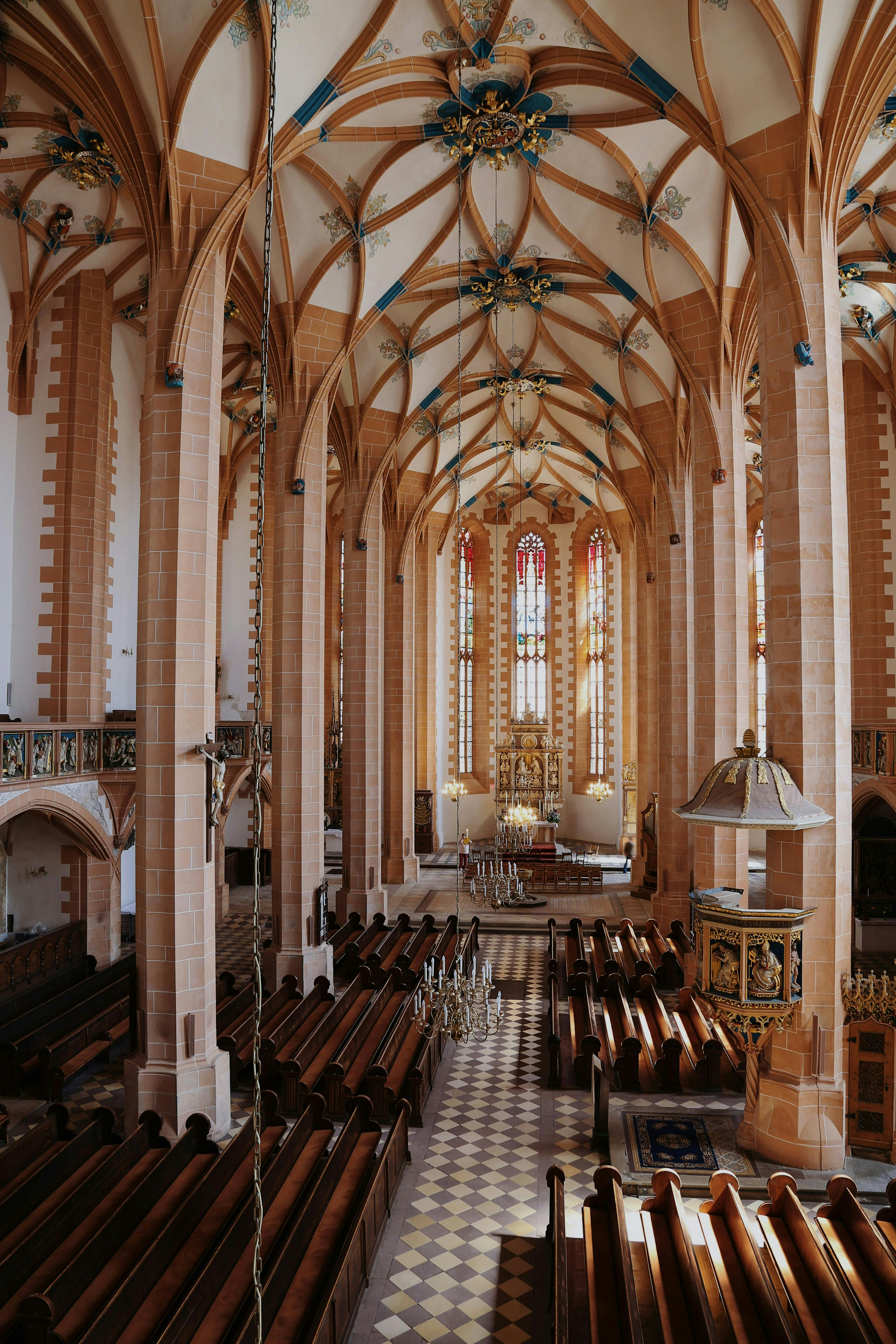 Intricate interior of St Anne's Church showcasing Gothic architecture in Annaberg-Buchholz, Germany.