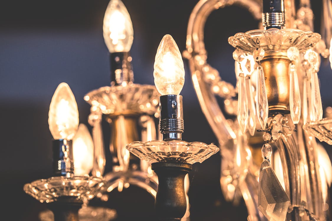 Chandeliers make a home feel more luxurious and glamorous. Photo by Lum3n from Pexels