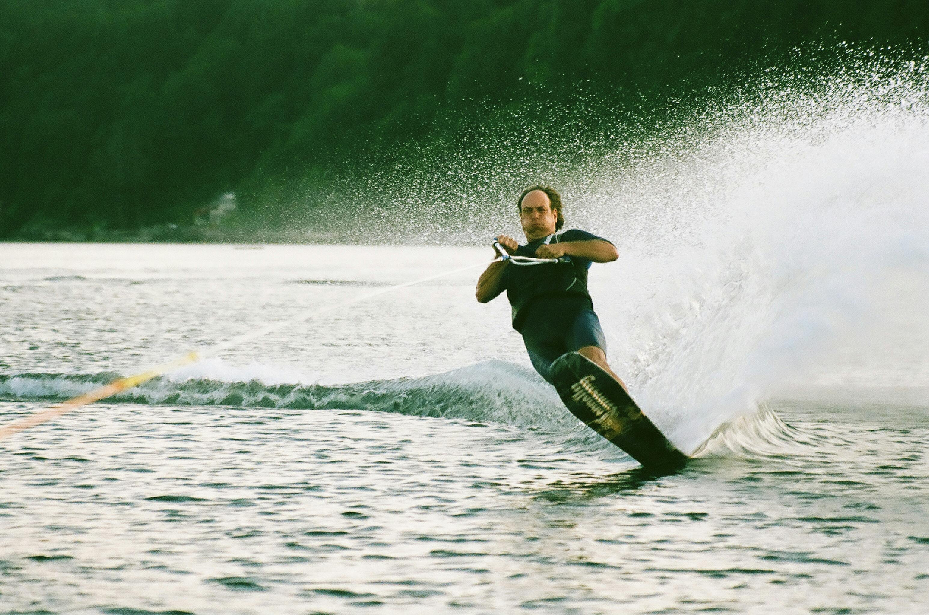 photo of man wakeboarding
