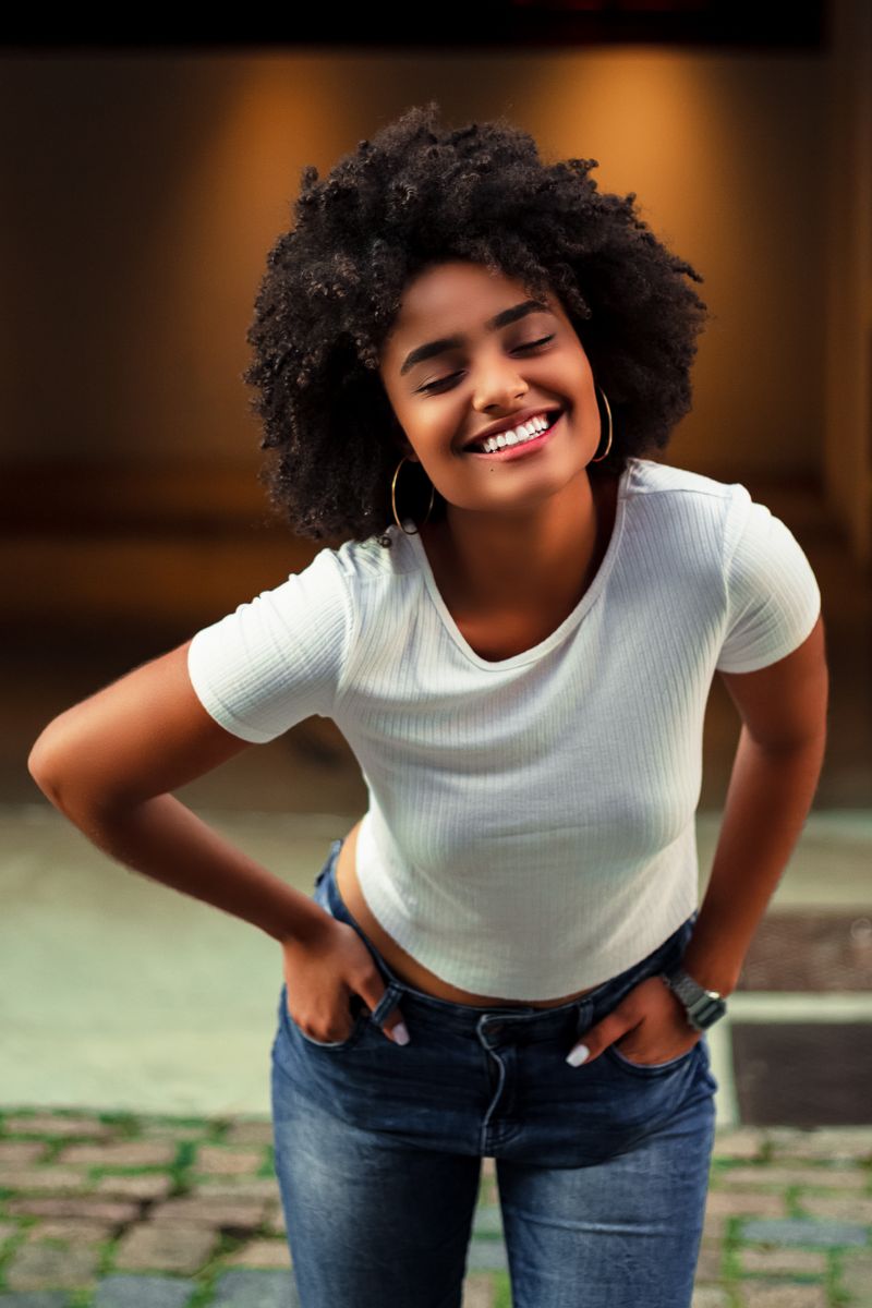 Smiling client in a white shirt outdoors