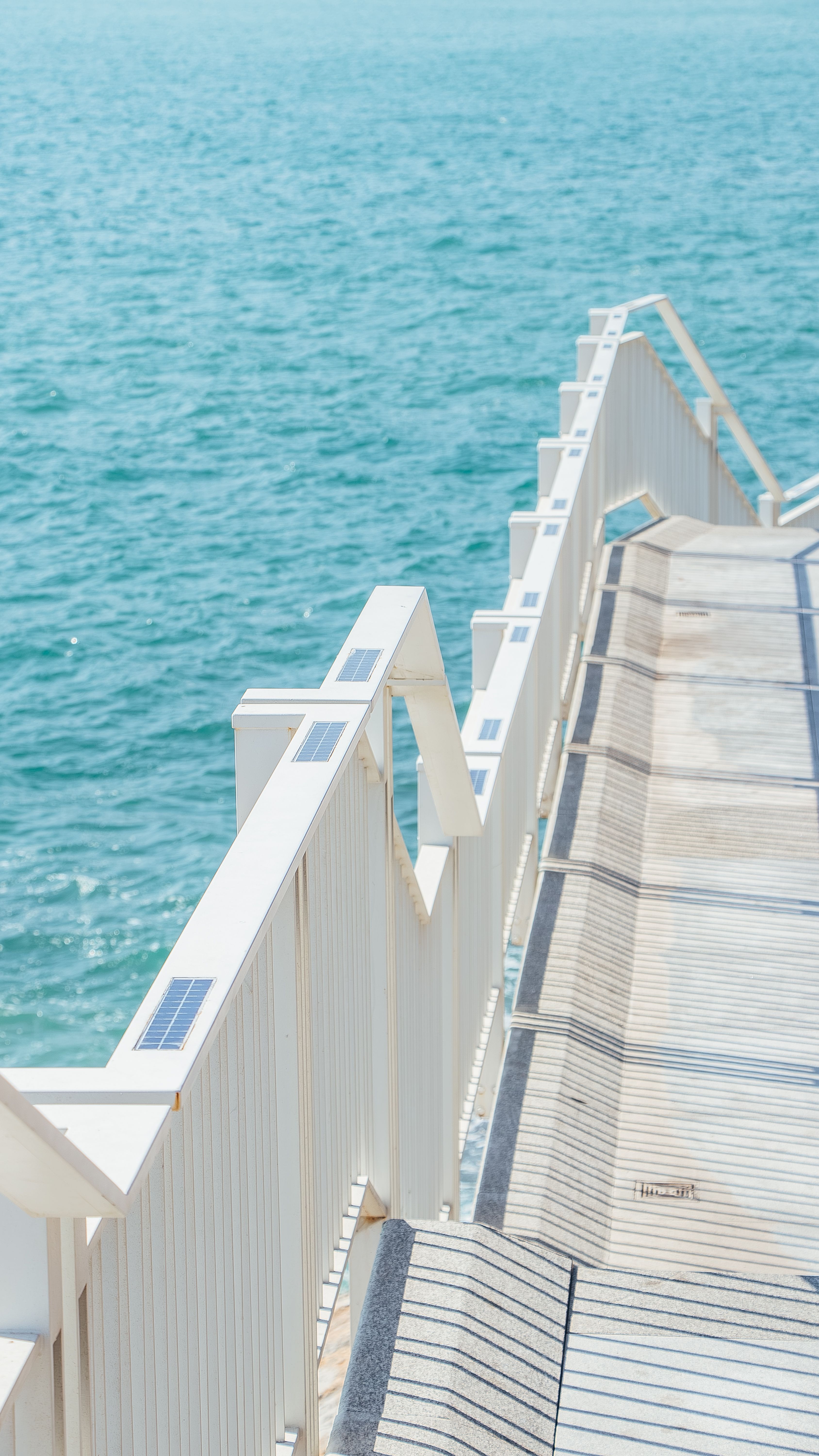 White Railing on Pier on Seashore · Free Stock Photo