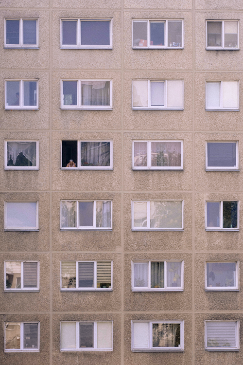 Free Facade of an apartment building in Vilnius, Lithuania, showcasing geometric windows. Stock Photo