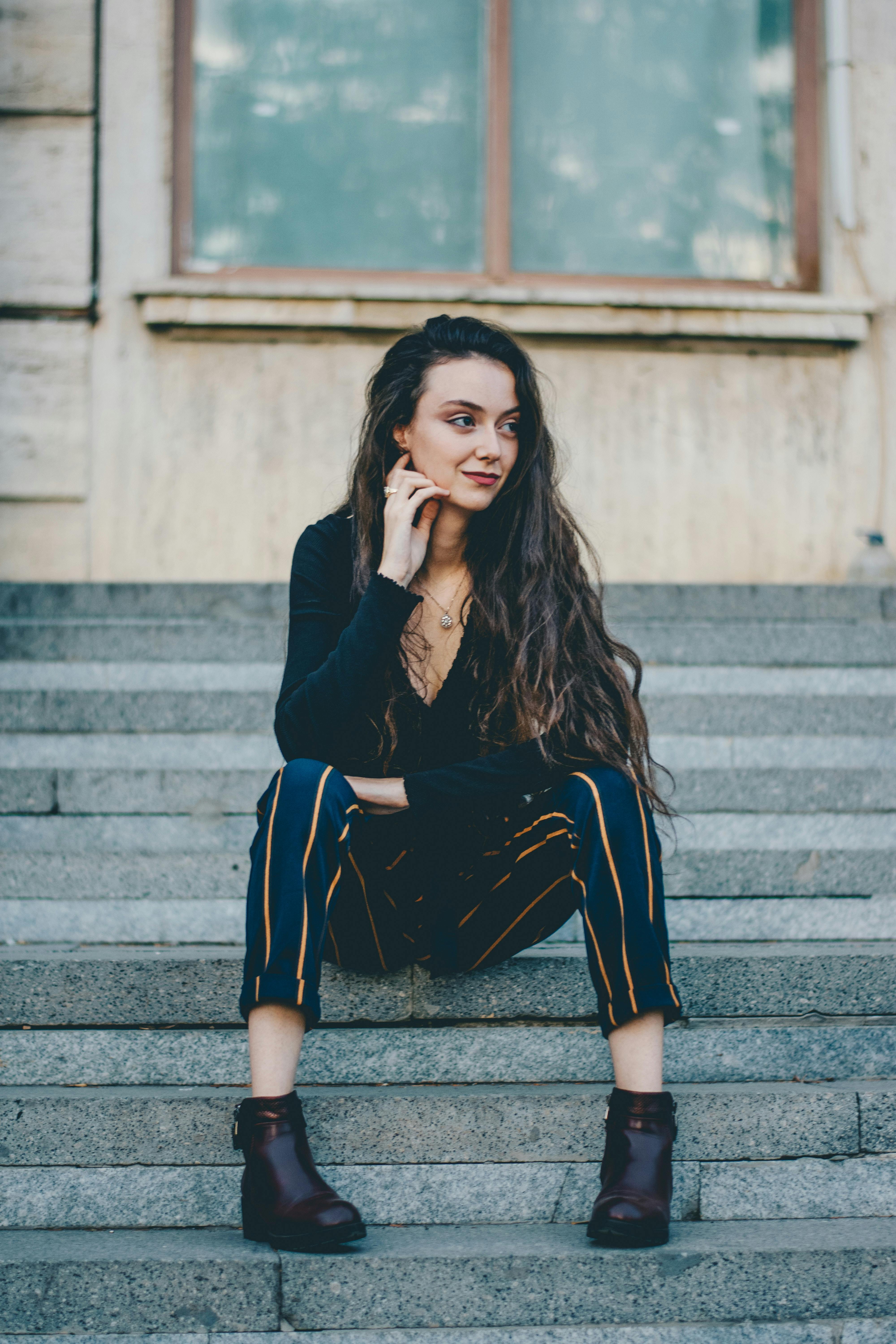 Photo of Woman Sitting on Chair · Free Stock Photo