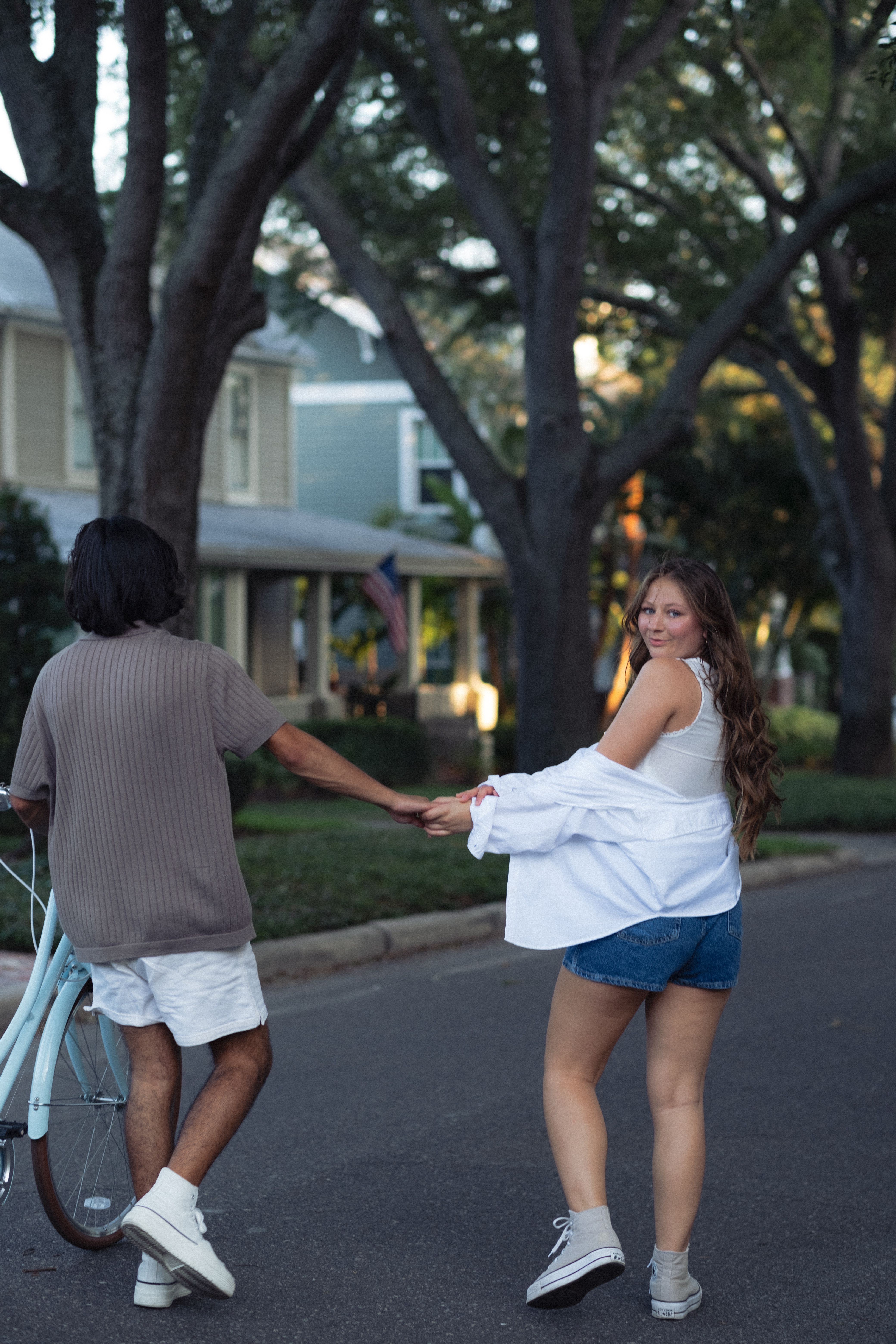 Couple Holding Hands and Walking on Street · Free Stock Photo