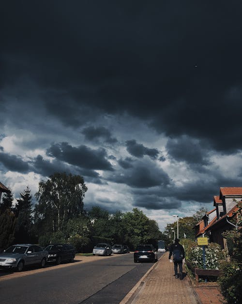 Car on Road Under Clouy Sky