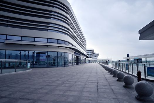 Explore the sleek modern design of Shenzhen's urban architecture. Perfect example of futuristic cityscapes.