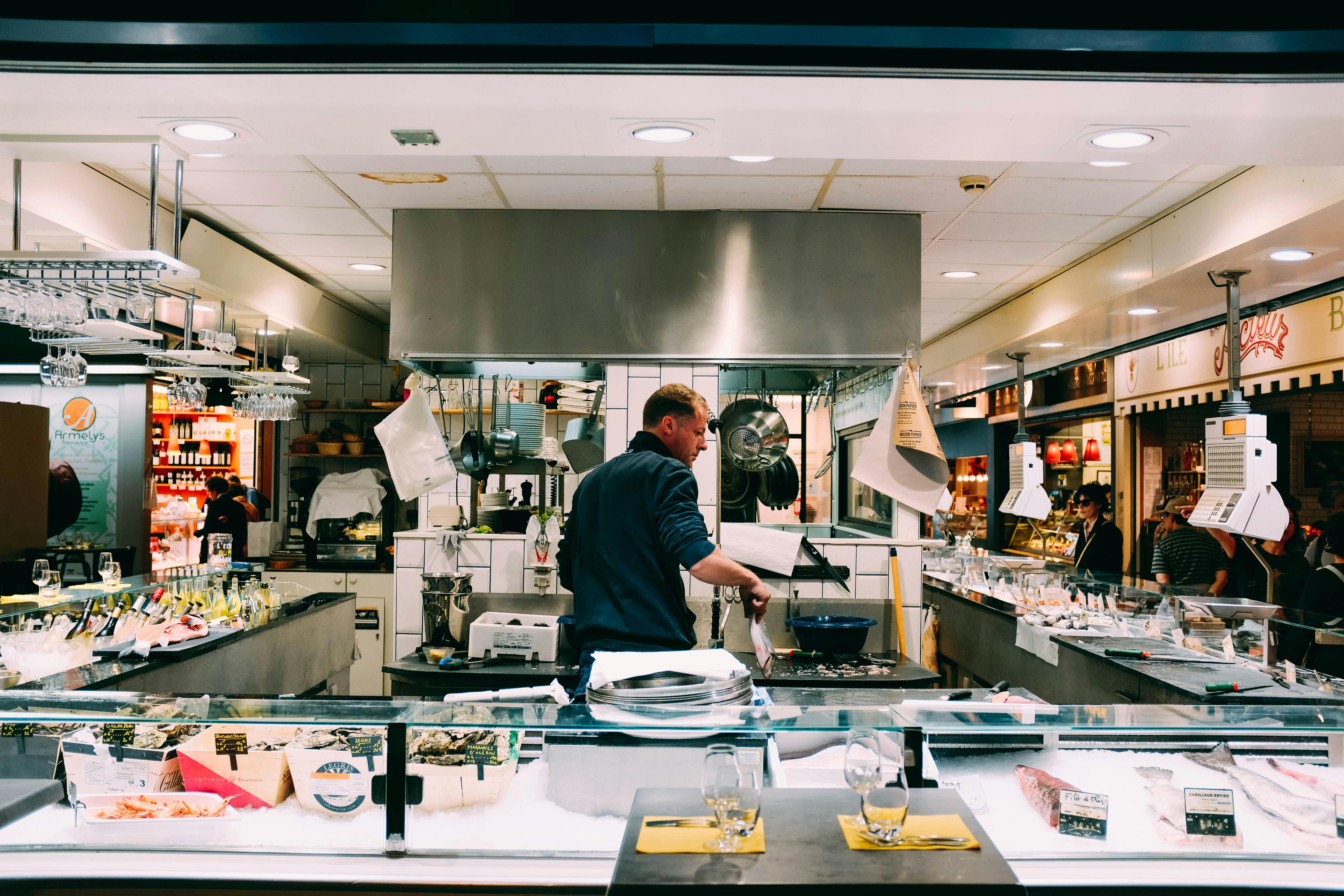 man preparing seafood