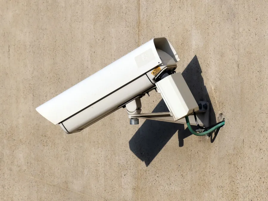 Bullet CCTV camera fixed on an exterior wall