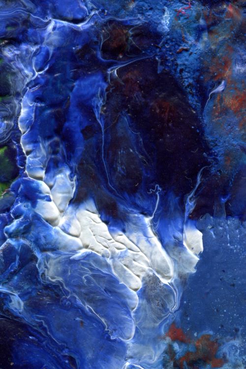 Free A captivating abstract art piece showcasing a dynamic blue and white fluid ink texture, perfect for modern backgrounds. Stock Photo
