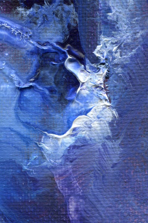 An abstract painting of blue and white