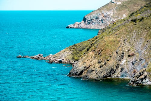 A view of the ocean and cliffs from a boat