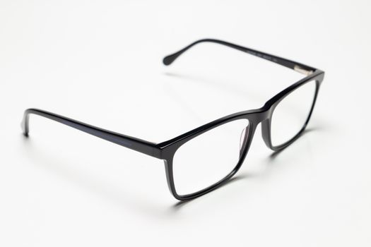 Close-up of stylish black eyeglasses perfect for fashion and eyewear content.
