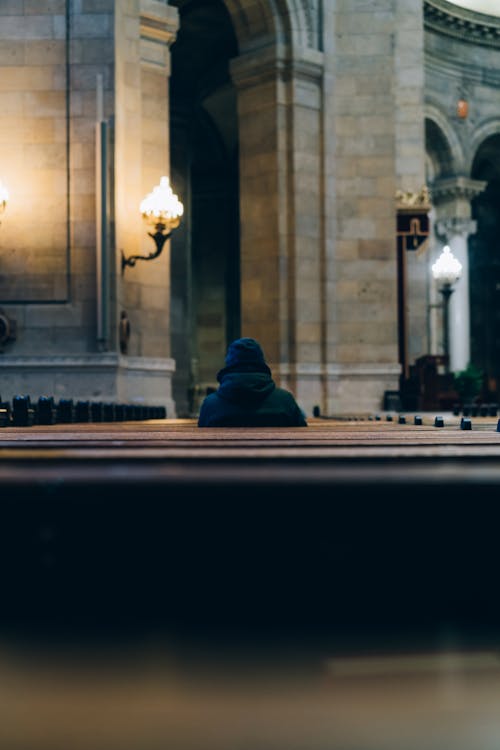 Person Sitting Inside Church