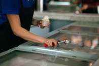 Woman Scooping Ice Cream