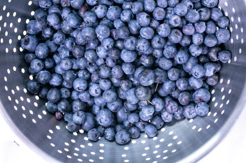 Close-Up Photo of Blueberries in Strainer