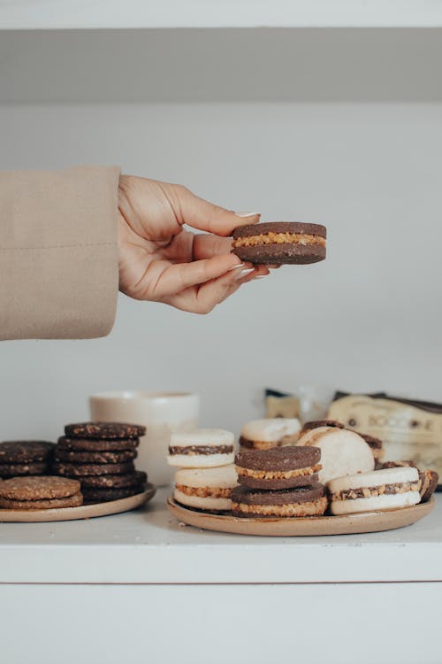 Gratis arkivbilde med cookies, hånd, hender menneskehender