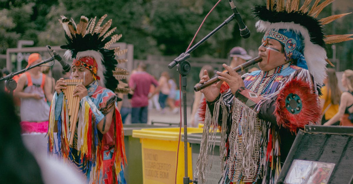 Photo of Two Native Americans Playing Woodwind Instruments · Free Stock ...