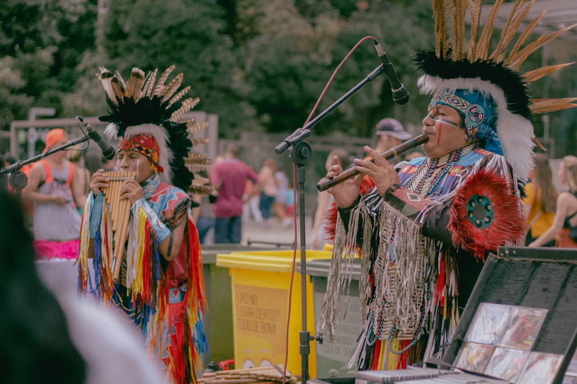 Free Photo of Two Native Americans Playing Woodwind Instruments Stock Photo