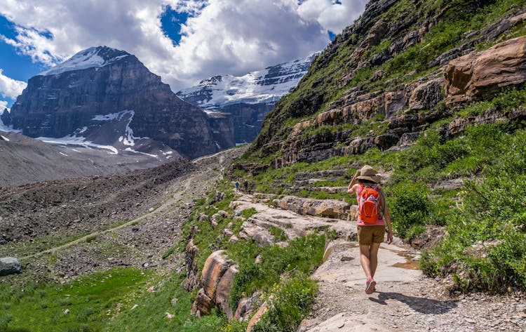 Person Walking On Mountain