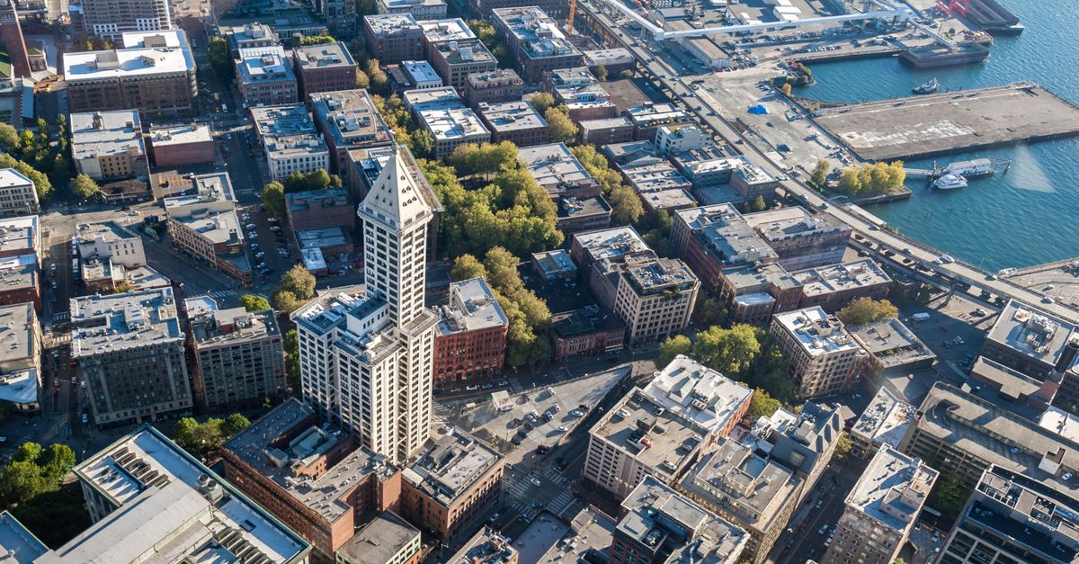 Stunning aerial view of Seattle's iconic downtown buildings and waterfront. Ideal for travel and architecture enthusiasts.