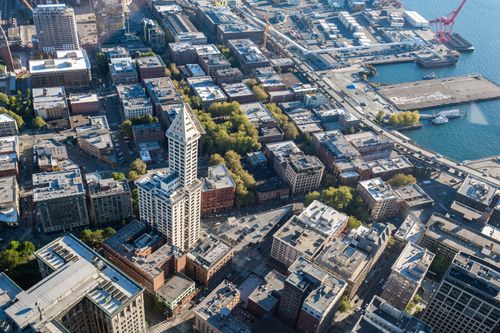 Free Stunning aerial view of Seattle's iconic downtown buildings and waterfront. Ideal for travel and architecture enthusiasts. Stock Photo