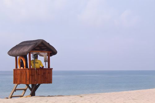 Lifeguard standing watch