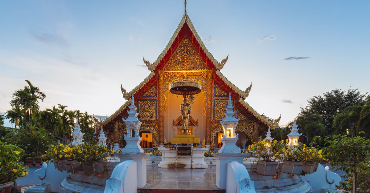 Stunning view of Wat Phra Singh Temple in Chiang Mai, Thailand during twilight.