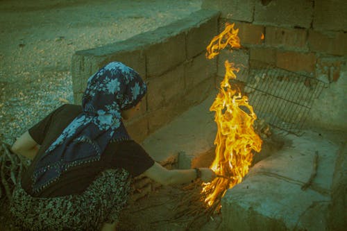 Free stock photo of arab woman, fire, middle east