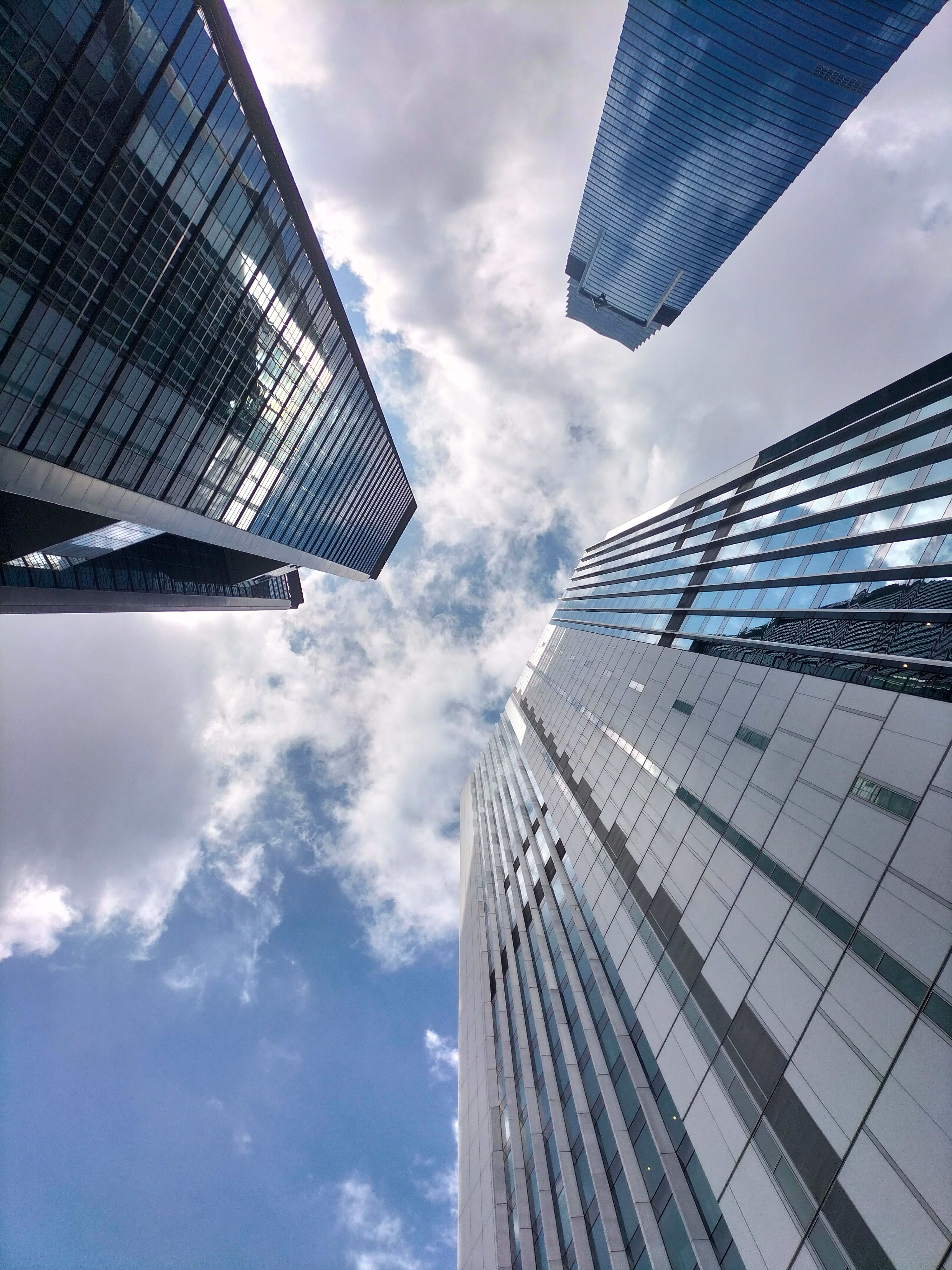 Low Angle Shot of Modern Skyscrapers in a City · Free Stock Photo